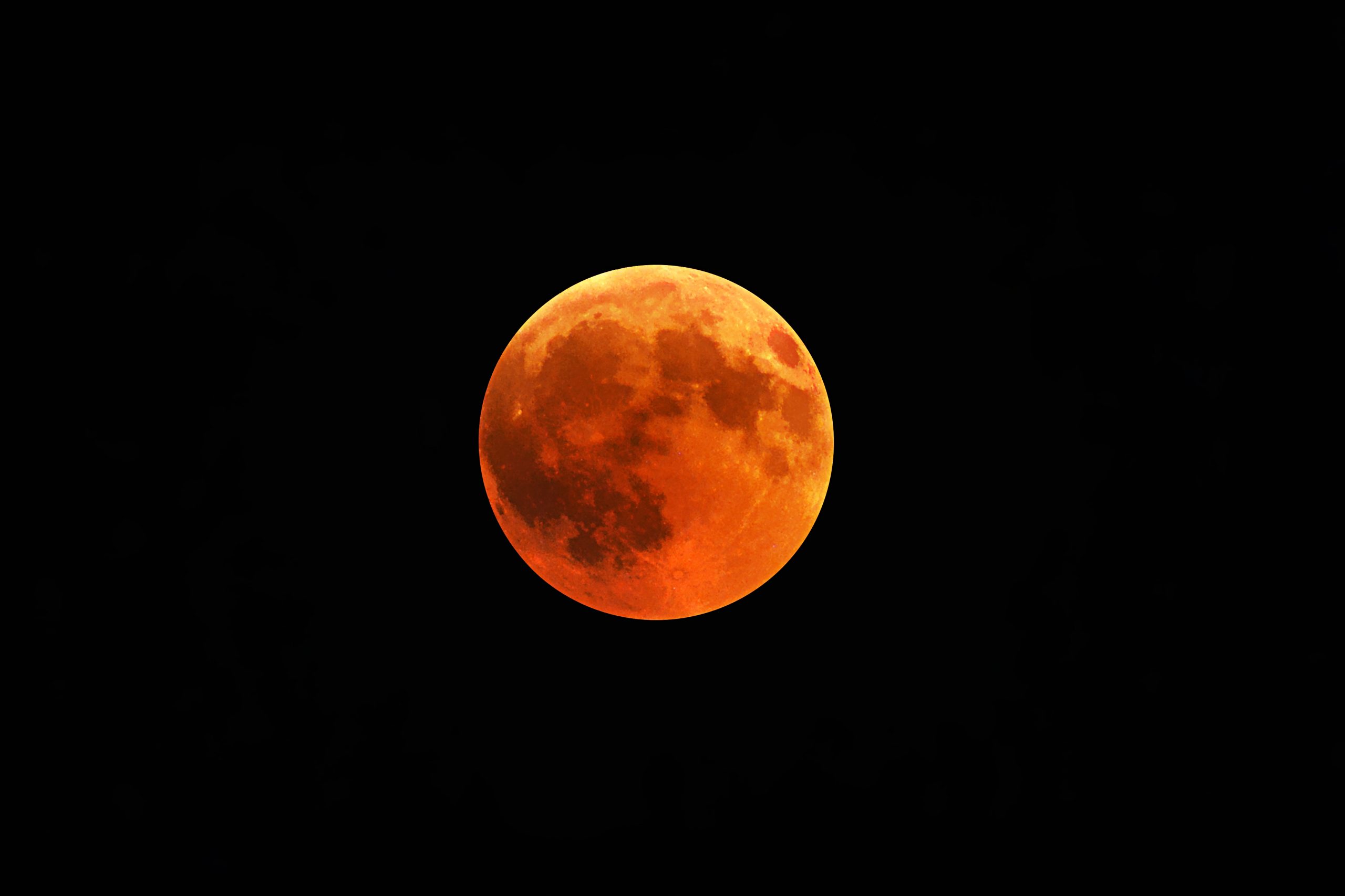 beautiful-shot-of-a-red-moon-total-lunar-eclipse-with-a-black-night-sky-in-the-background