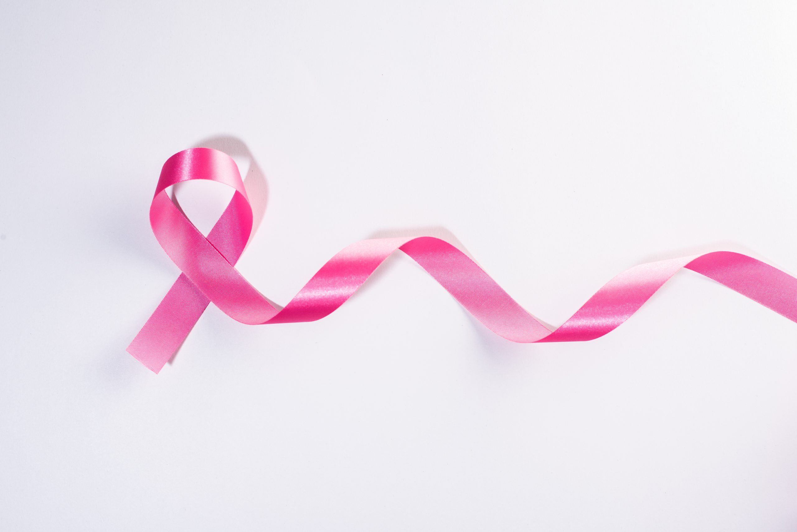 pink-ribbon-cancer-sign-on-white